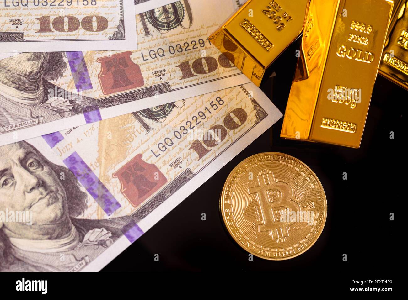 Banknote gold bars gold coin hi-res stock photography and images - Alamy