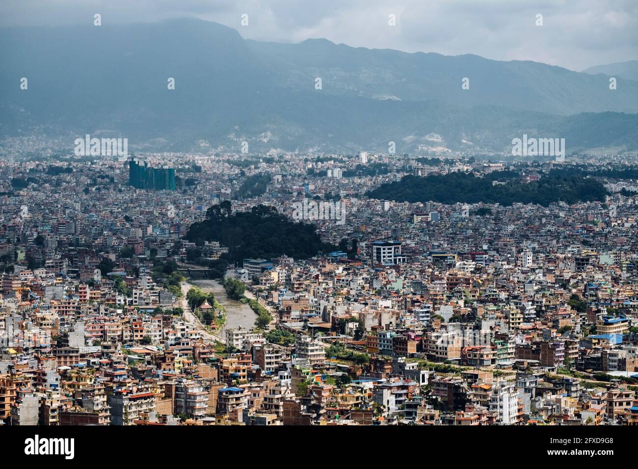The city of Kathmandu extension against Himalayan mountains in Nepal