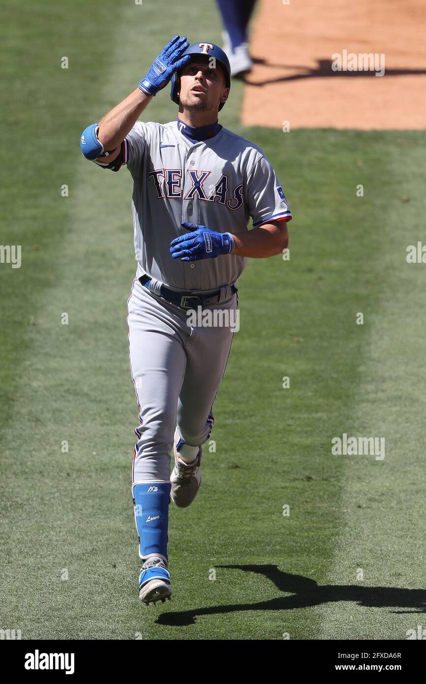 May 26, 2021: Texas Rangers first baseman Nate Lowe (30) looks up before crowding home plate after his homer during the game between the Texas Rangers and the Los Angeles Angels of Anaheim at Angel Stadium in Anaheim, CA, (Photo by Peter Joneleit, Cal Sport Media) Stock Photo