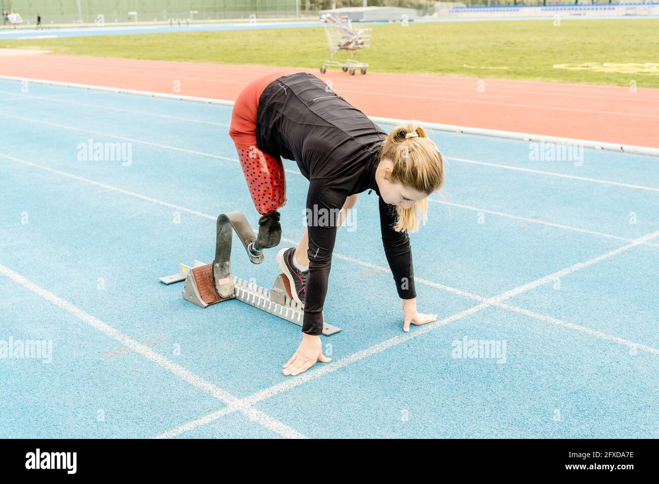 Side view of female athlete with prosthetic leg Stock Photo Alamy