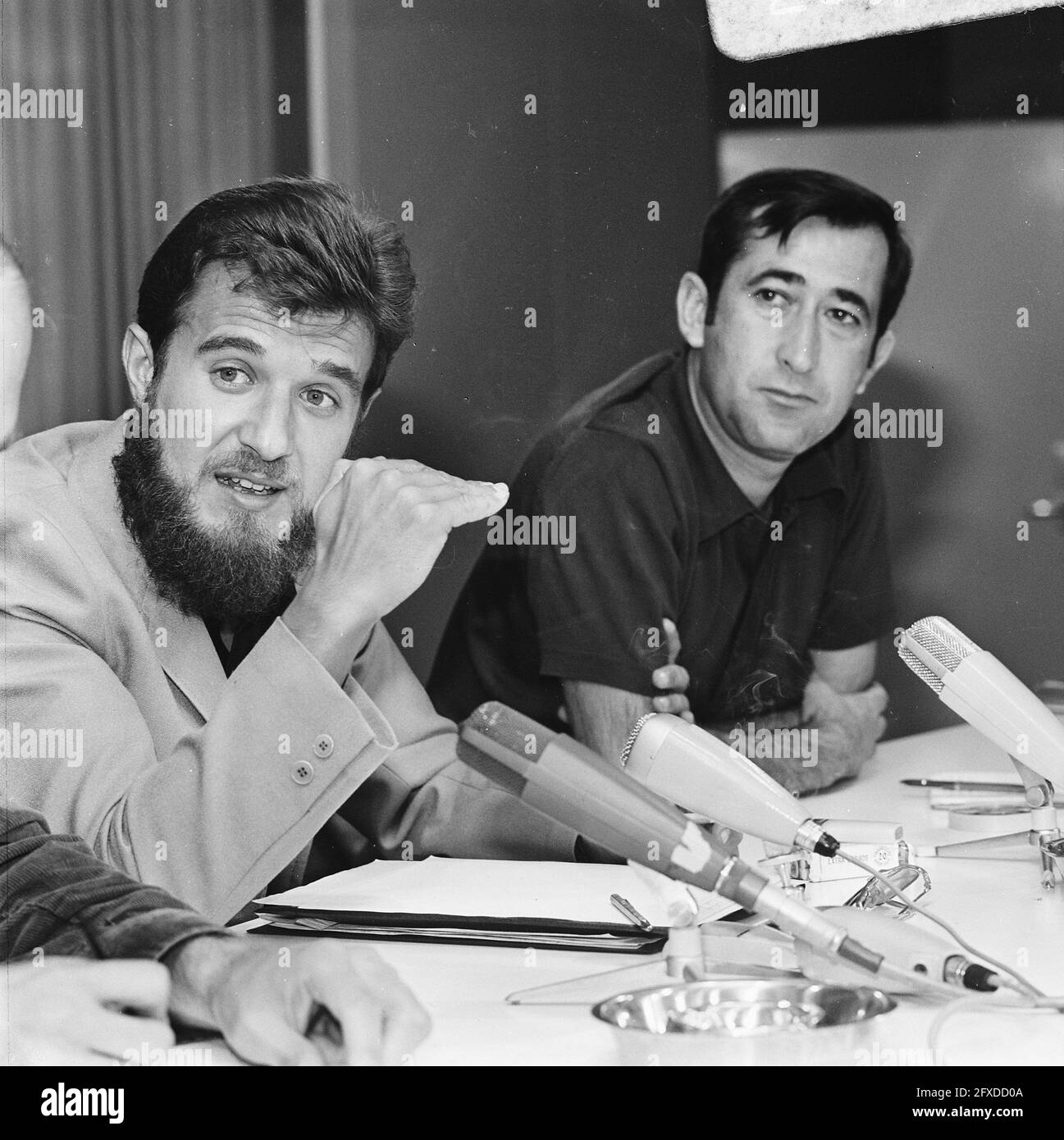Spanish Fathers, who worked in Mozambique, at Schiphol Airport, left Julio Moure and Vincerte Berenguer, July 31, 1973, priests, The Netherlands, 20th century press agency photo, news to remember, documentary, historic photography 1945-1990, visual stories, human history of the Twentieth Century, capturing moments in time Stock Photo
