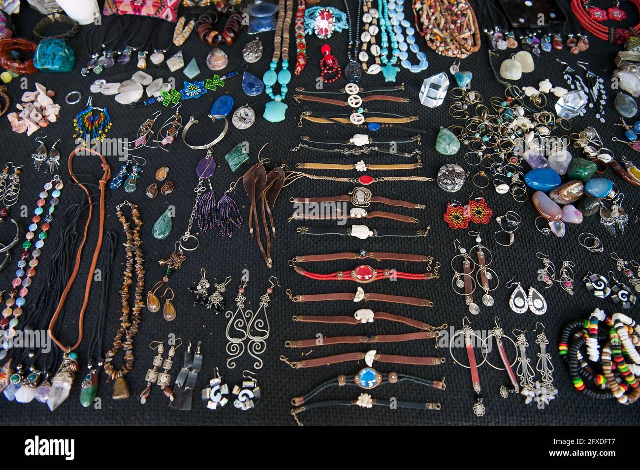 Colorful hand crafted jewelry for sale in market in Tamarindo, Costa Rica Stock Photo