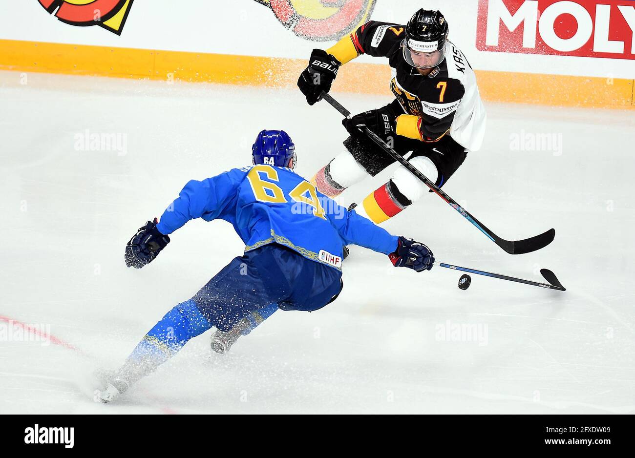 Riga, Latvia. 26th May, 2021. Kazakhstan's defensemen Samat Daniyar (L) vies with Germany's forward Maximilian Kastner during the Group B match between Germany and Kazakhstan at the 2021 IIHF Ice Hockey World Riga, Latvia. 26th May, 2021. Kazakhstan's defensemen Samat Daniyar (L) vies with Germany's forward Maximilian Kastner during the Group B match between Germany and Kazakhstan at the 2021 IIHF Ice Hockey World