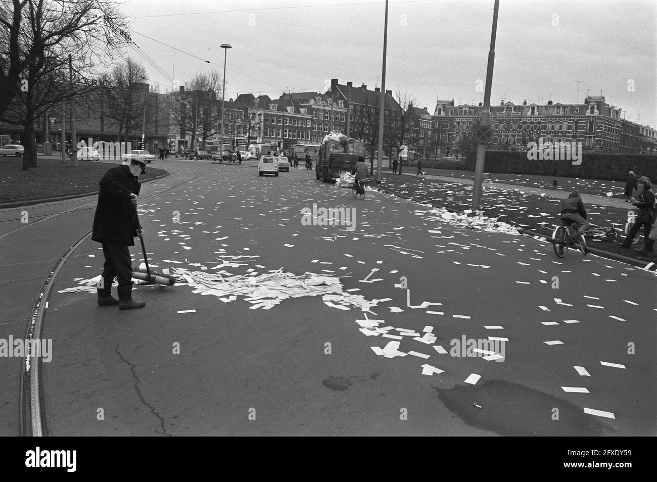 Street sweeper sweeps together garbage hires stock photography and