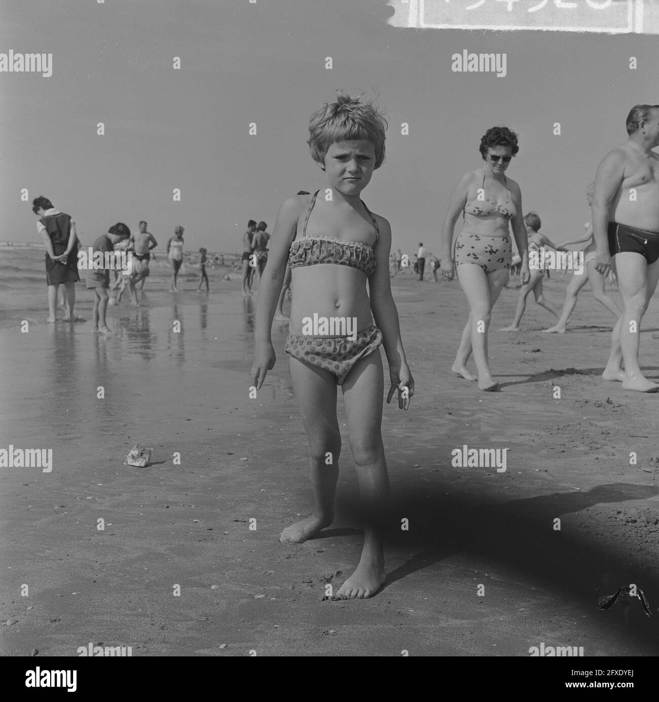 Beach fashion 1963 in practice on the Zandvoort beach. Little girl