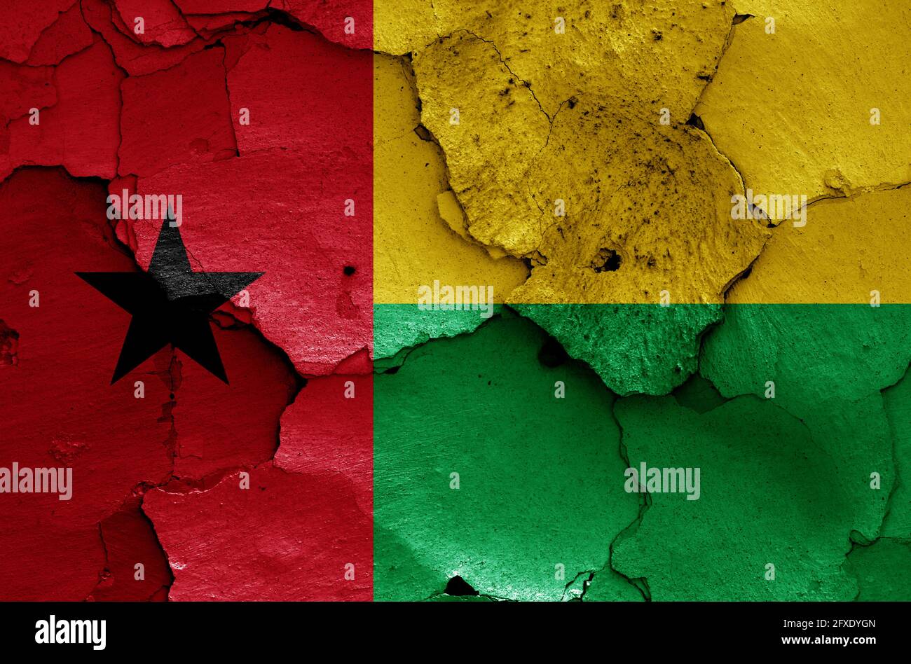 flag of Guinea-Bissau painted on cracked wall Stock Photo