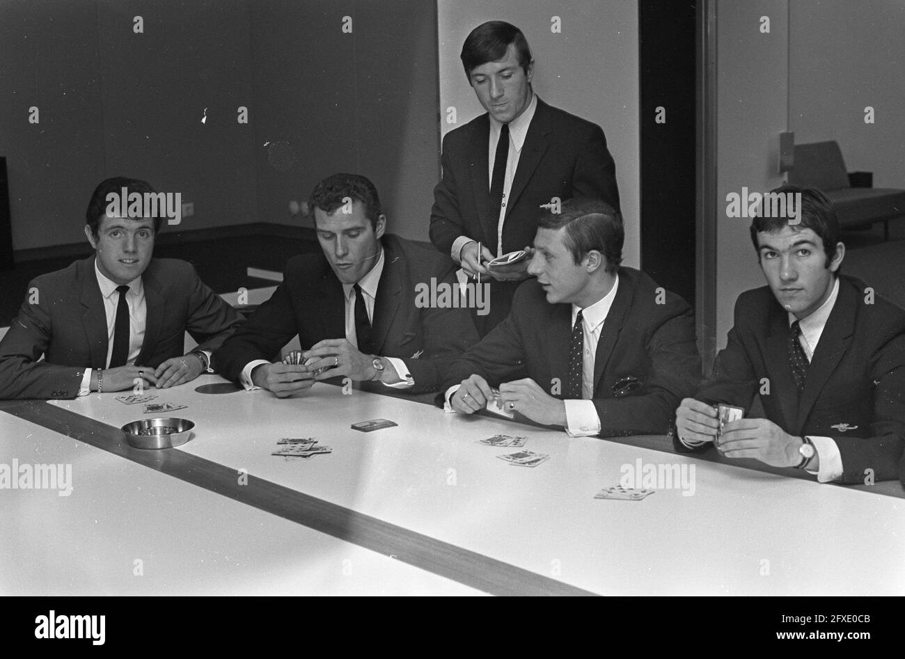 Arrival of Arsenal at Schiphol Airport. Some players: from left to right David Jenkins, goalkeeper Jim Furnell, Georg Armstrong, Jo Radford (?), Jon Sammels/, November 13, 1967, PLAYERS, goalkeepers, sports, soccer, The Netherlands, 20th century press agency photo, news to remember, documentary, historic photography 1945-1990, visual stories, human history of the Twentieth Century, capturing moments in time Stock Photo