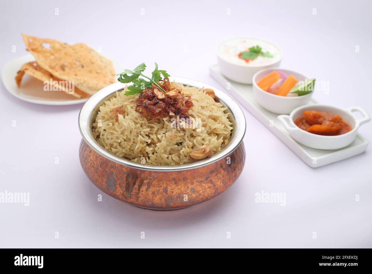 Veg Biriyani , garnished with fried onion ,coriander leaf and fried