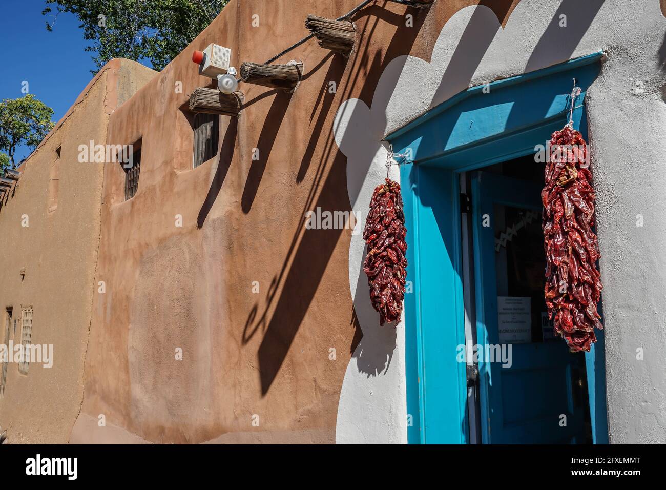 Chilis Hanging Outside Home in Santa Fe New Mexico Stock Photo