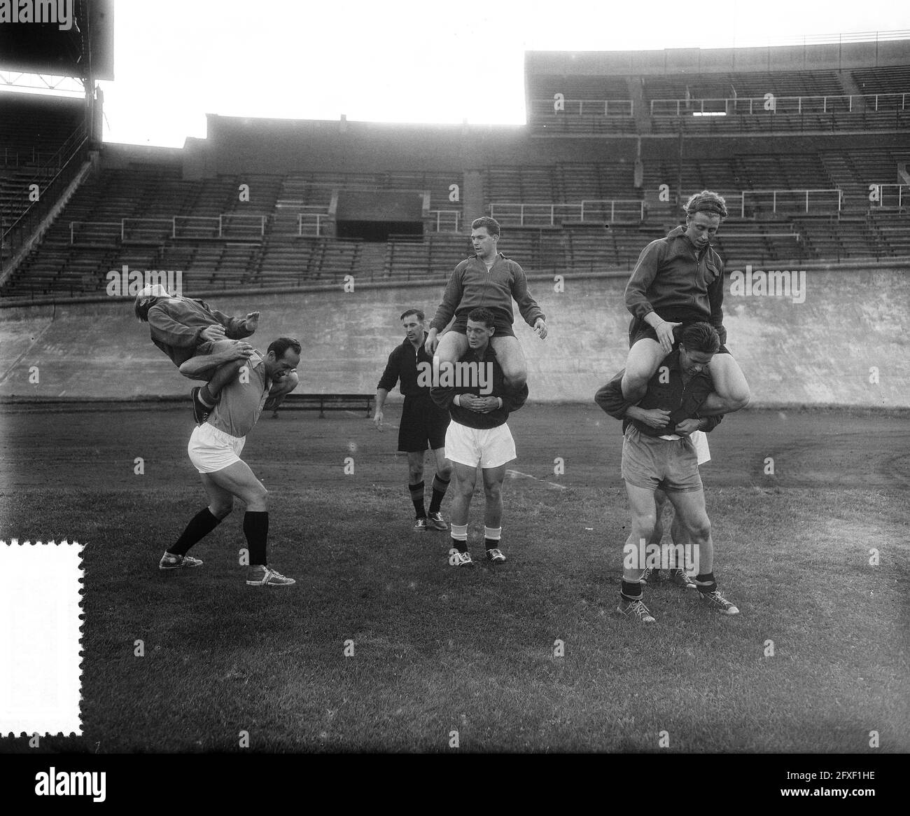 Training Dutch national football team, gymnastic exercises, September 6, 1955, sport, soccer, The Netherlands, 20th century press agency photo, news to remember, documentary, historic photography 1945-1990, visual stories, human history of the Twentieth Century, capturing moments in time Stock Photo