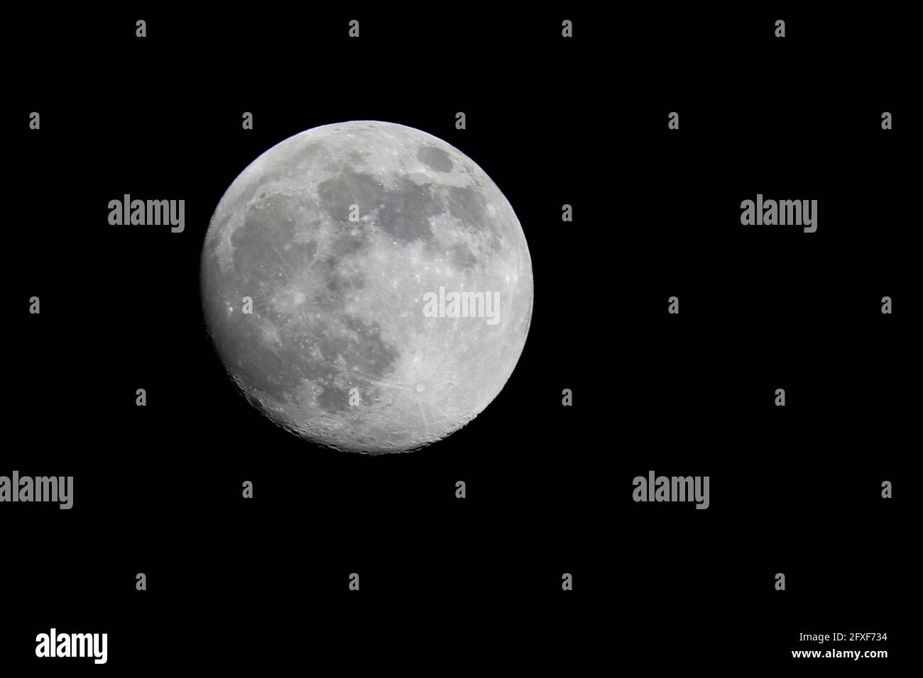 Full moon isolated on the black background Stock Photo