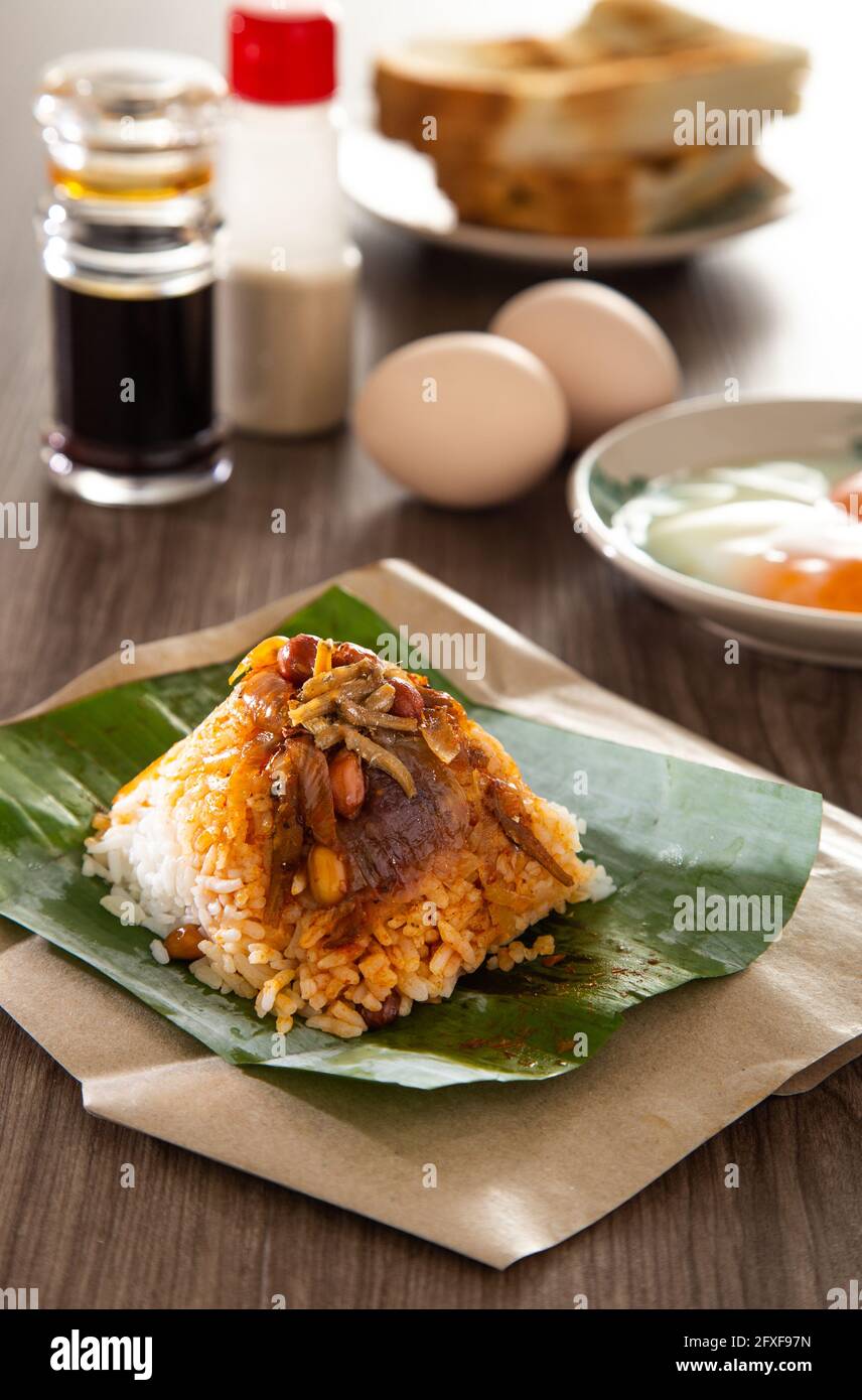 Common oriental breakfast set in Malaysia consisting of coffee, nasi
