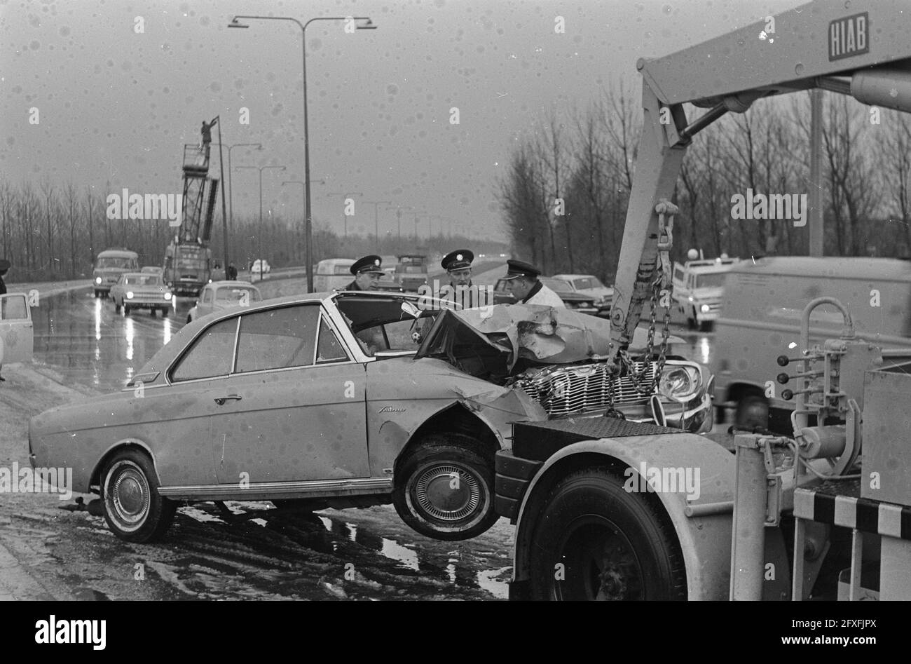Two autos collide on Gooiseweg, one of the skidded cars, March 31, 1967, cars, accidents, The Netherlands, 20th century press agency photo, news to remember, documentary, historic photography 1945-1990, visual stories, human history of the Twentieth Century, capturing moments in time Stock Photo