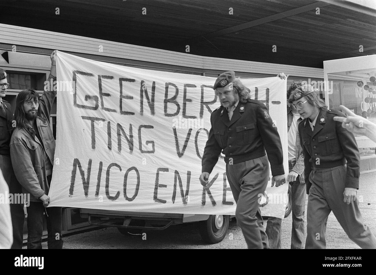 Two soldiers for court-martial Arnhem because of strike in Hohne ( West Germany ); Nico Bruijstens (with glasses) and Kees van Dijk by banner, June 13, 1974, MILITARY, Strikes, The Netherlands, 20th century press agency photo, news to remember, documentary, historic photography 1945-1990, visual stories, human history of the Twentieth Century, capturing moments in time Stock Photo