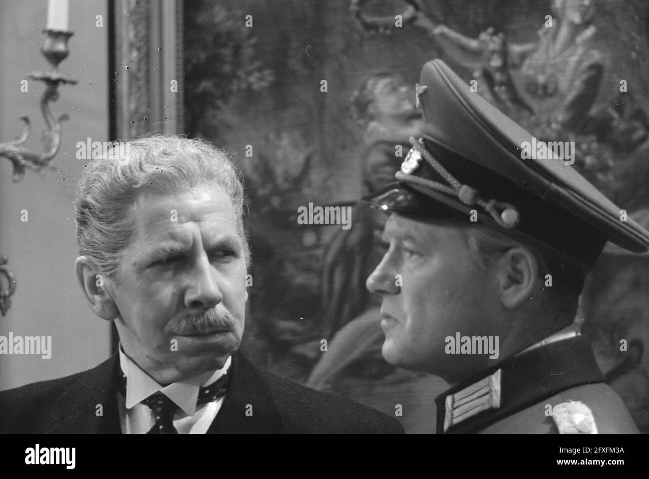 T. V. Game The Flycatcher. Max Croiset as Colonel Lanser and Joan Remmelts as Mayor Orden, May 4, 1961, actors, television dramas, The Netherlands, 20th century press agency photo, news to remember, documentary, historic photography 1945-1990, visual stories, human history of the Twentieth Century, capturing moments in time Stock Photo
