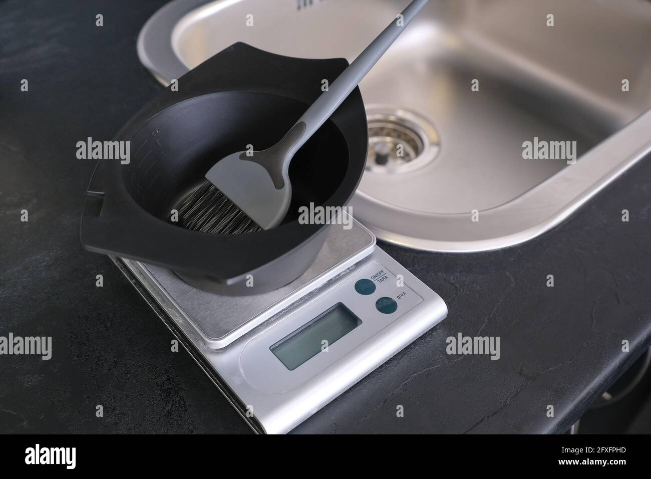 Hair dye measuring and mixing kit. Mixing bowl and hair dye brush on  electronic scale. Hair coloring tools set. Professional instrument for hair  color Stock Photo - Alamy