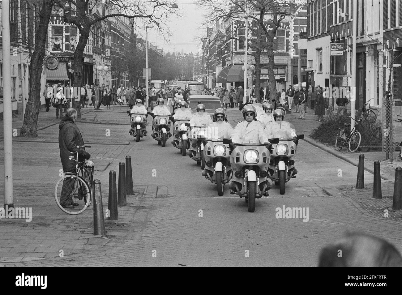 Funeral of senior police officer W. Schepen, shot dead last Saturday, the procession was surrounded by members of the Rotterdam motorcycle police, February 7, 1985, Funerals, processions, The Netherlands, 20th century press agency photo, news to remember, documentary, historic photography 1945-1990, visual stories, human history of the Twentieth Century, capturing moments in time Stock Photo