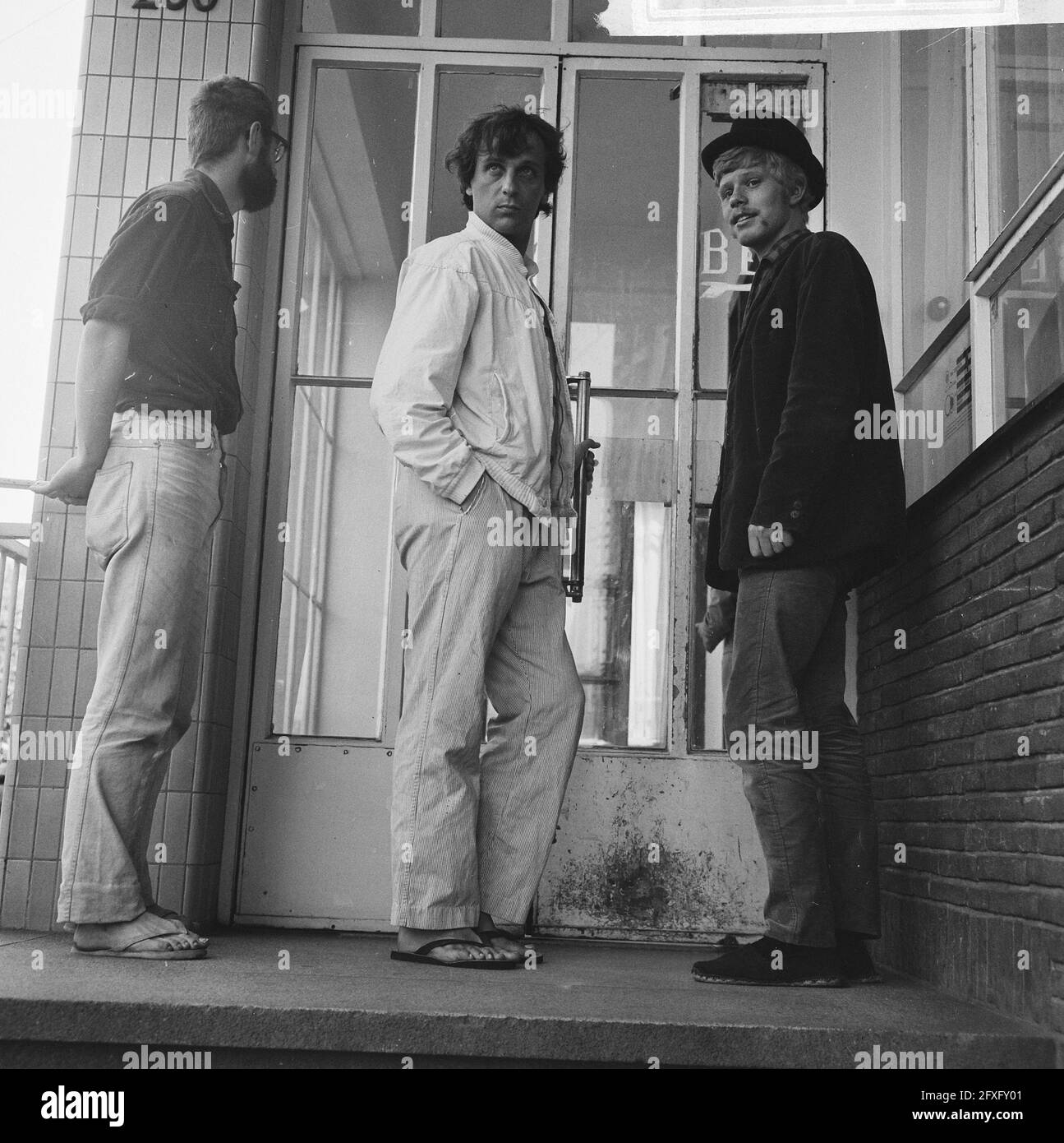 From left to right Van Duyn, Grootveld and Stolk, 14 August 1965, activists, police, The Netherlands, 20th century press agency photo, news to remember, documentary, historic photography 1945-1990, visual stories, human history of the Twentieth Century, capturing moments in time Stock Photo