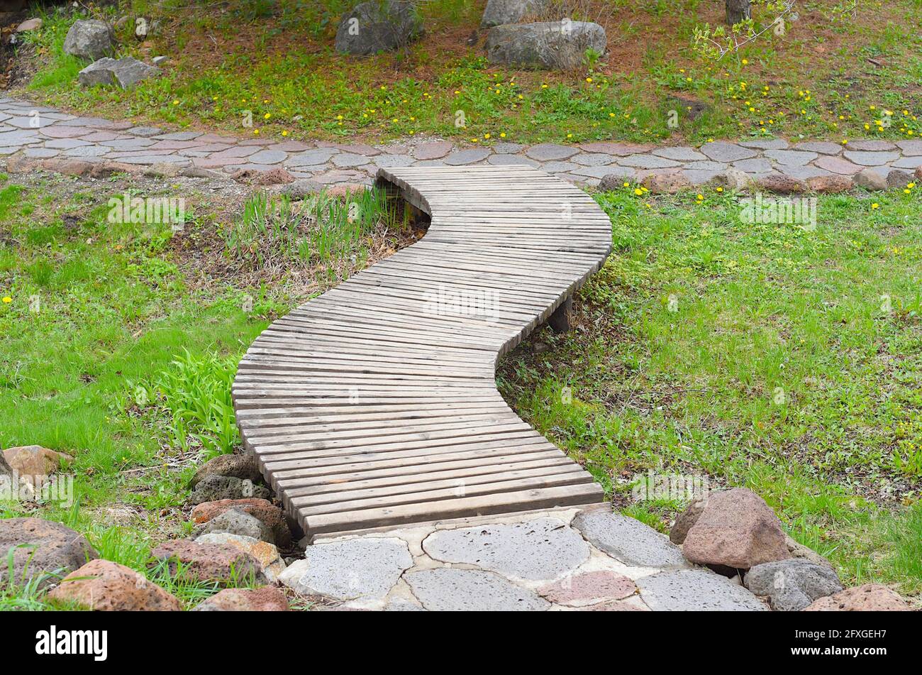 Creative design of wooden walkway. Garden decoration Stock Photo