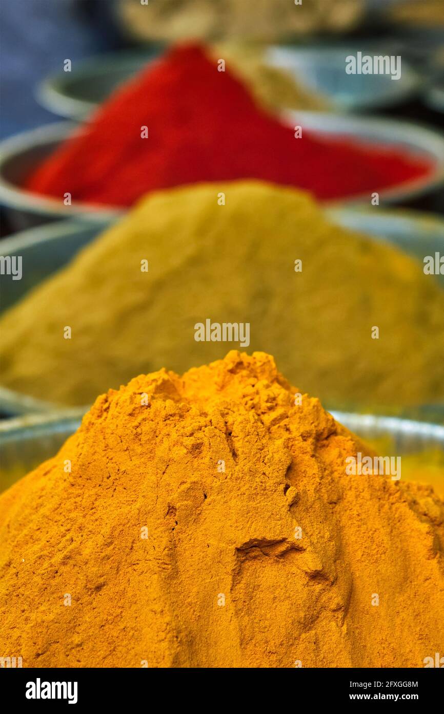 Turmeric curcuma powder and chili powder in spices market in India