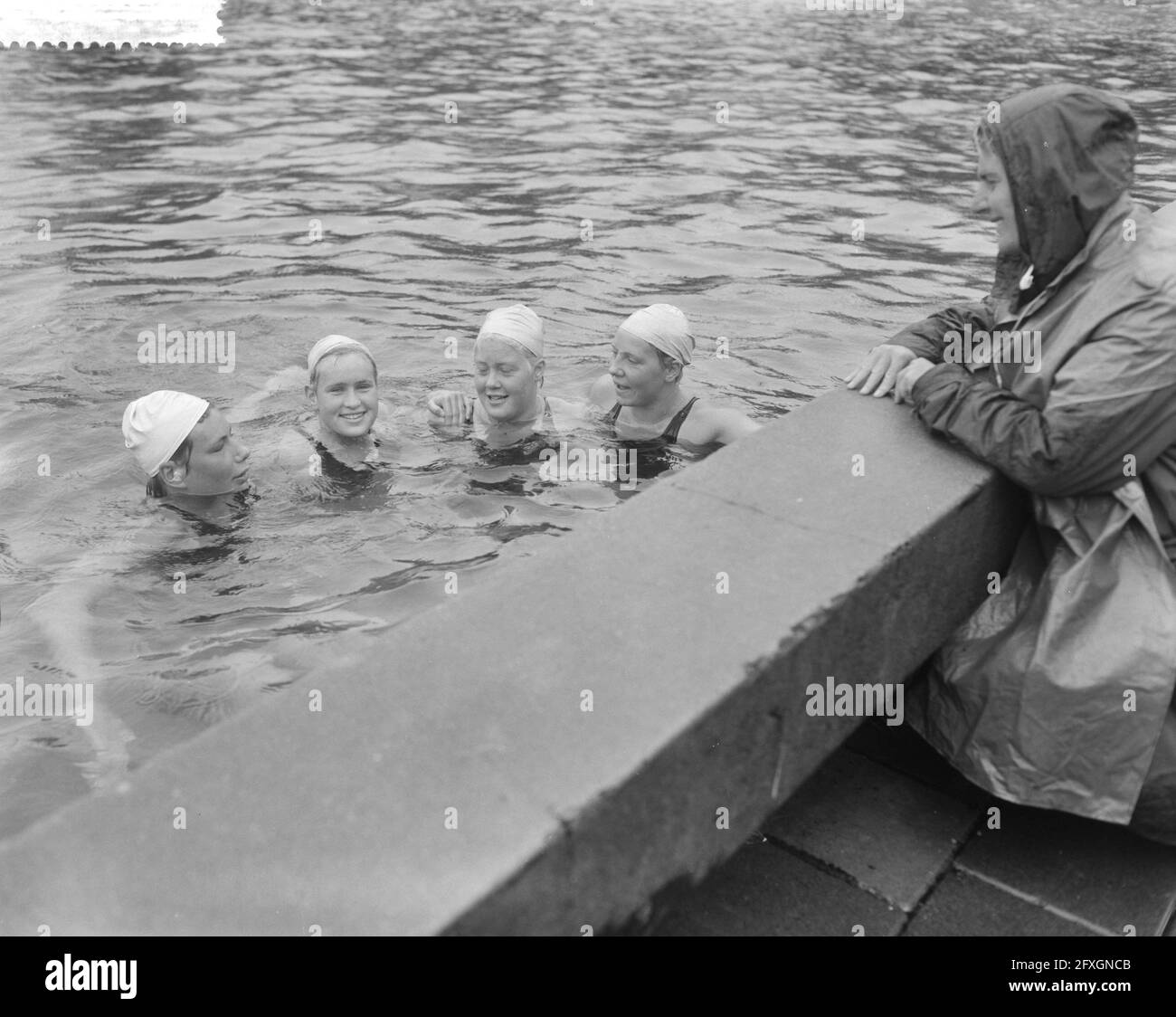 Four Naarden swimmers going to the Olympic Games from left to right A. den Haan, M. Heemskerk, A. Voorbij and T. Lagerberg, August 15, 1960, Olympic Games, The Netherlands, 20th century press agency photo, news to remember, documentary, historic photography 1945-1990, visual stories, human history of the Twentieth Century, capturing moments in time Stock Photo