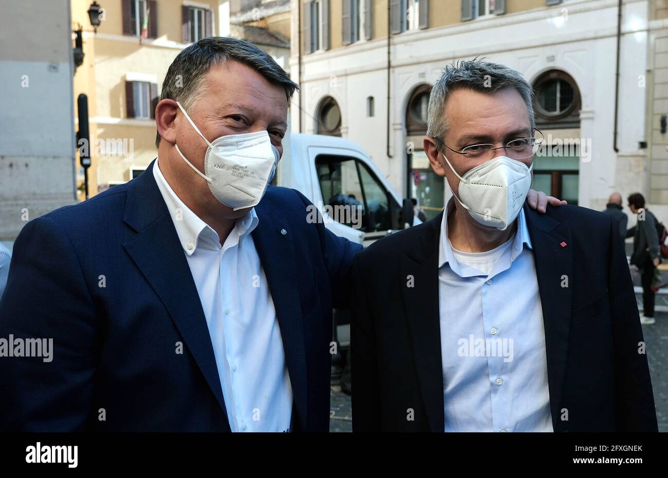 Italy, Rome, may 26, 2021 : Cgil Cisl Uil trade union demonstration against deaths at work, in front of italian Parliament. Pictured (R) Maurizio Landini secretary of the CGIL trade union and (L) Pierpaolo Bombardieri secretary of the UIL trade union.   Photo © Fabio Cimaglia/Sintesi/Alamy Live News Stock Photo