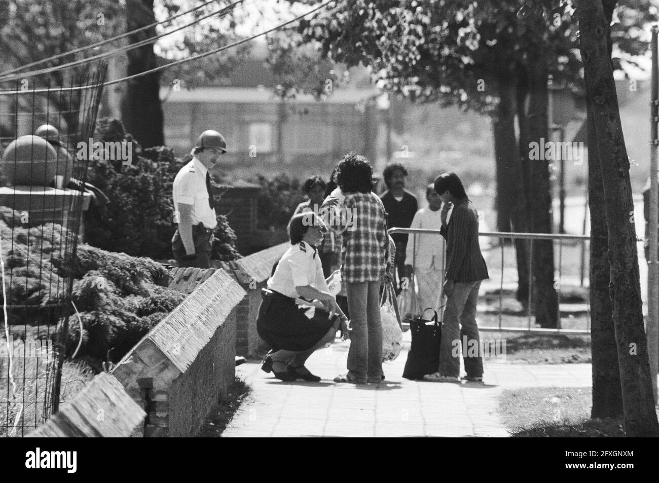 Fifth, sixth, seventh day hostage taking school Bovensmilde (Whitsun); South Moluccan children are searched by police, 28 May 1977, search, children, police, schools, The Netherlands, 20th century press agency photo, news to remember, documentary, historic photography 1945-1990, visual stories, human history of the Twentieth Century, capturing moments in time Stock Photo