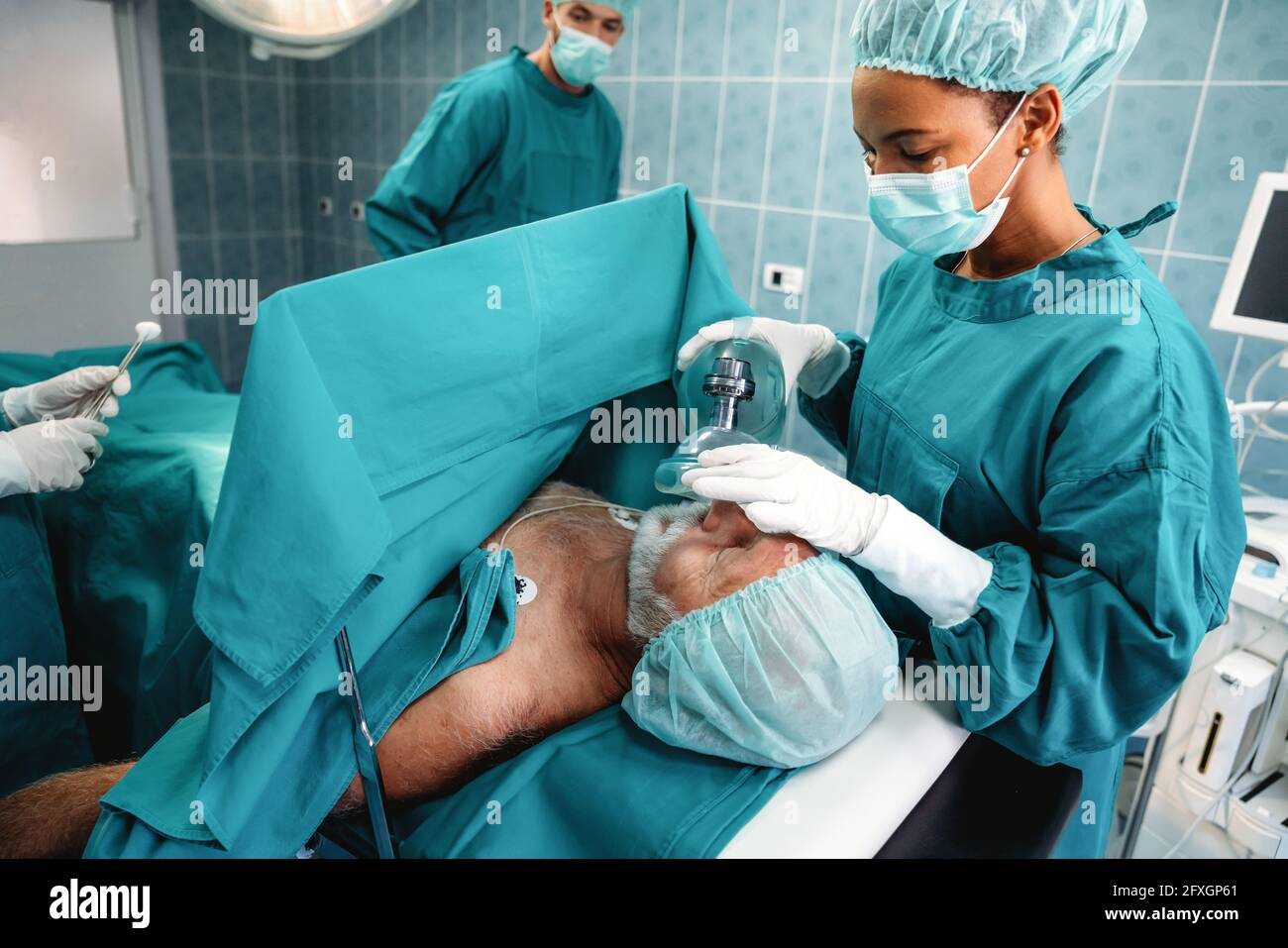 Group of surgeon doctor team at work in operating room Stock Photo - Alamy