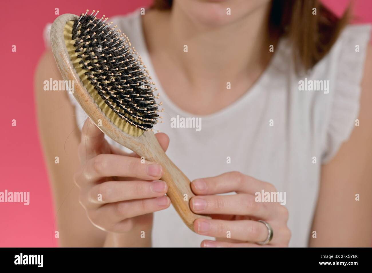Young Woman Holding A Brush Hair Damaged Loss Hair Stock Photo