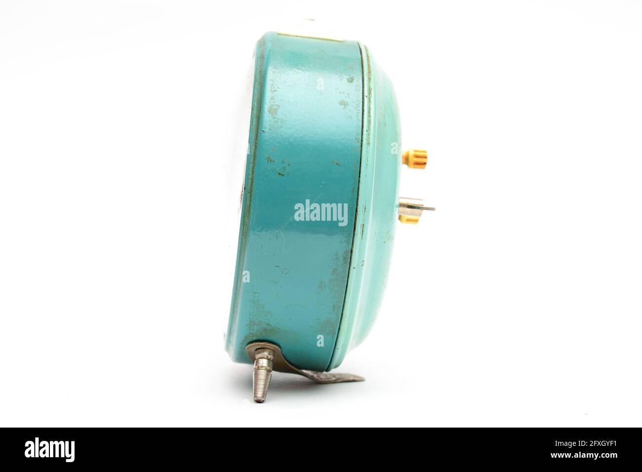 Old mechanical alarm clock on white background Stock Photo - Alamy