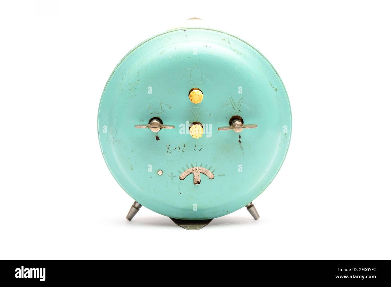 Old mechanical alarm clock on white background Stock Photo - Alamy