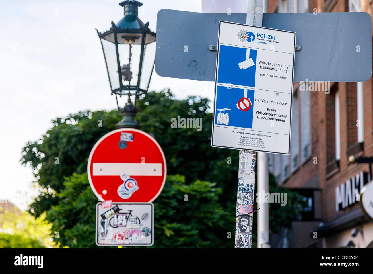 Information sign of the police, video surveillance in old town Stock Photo