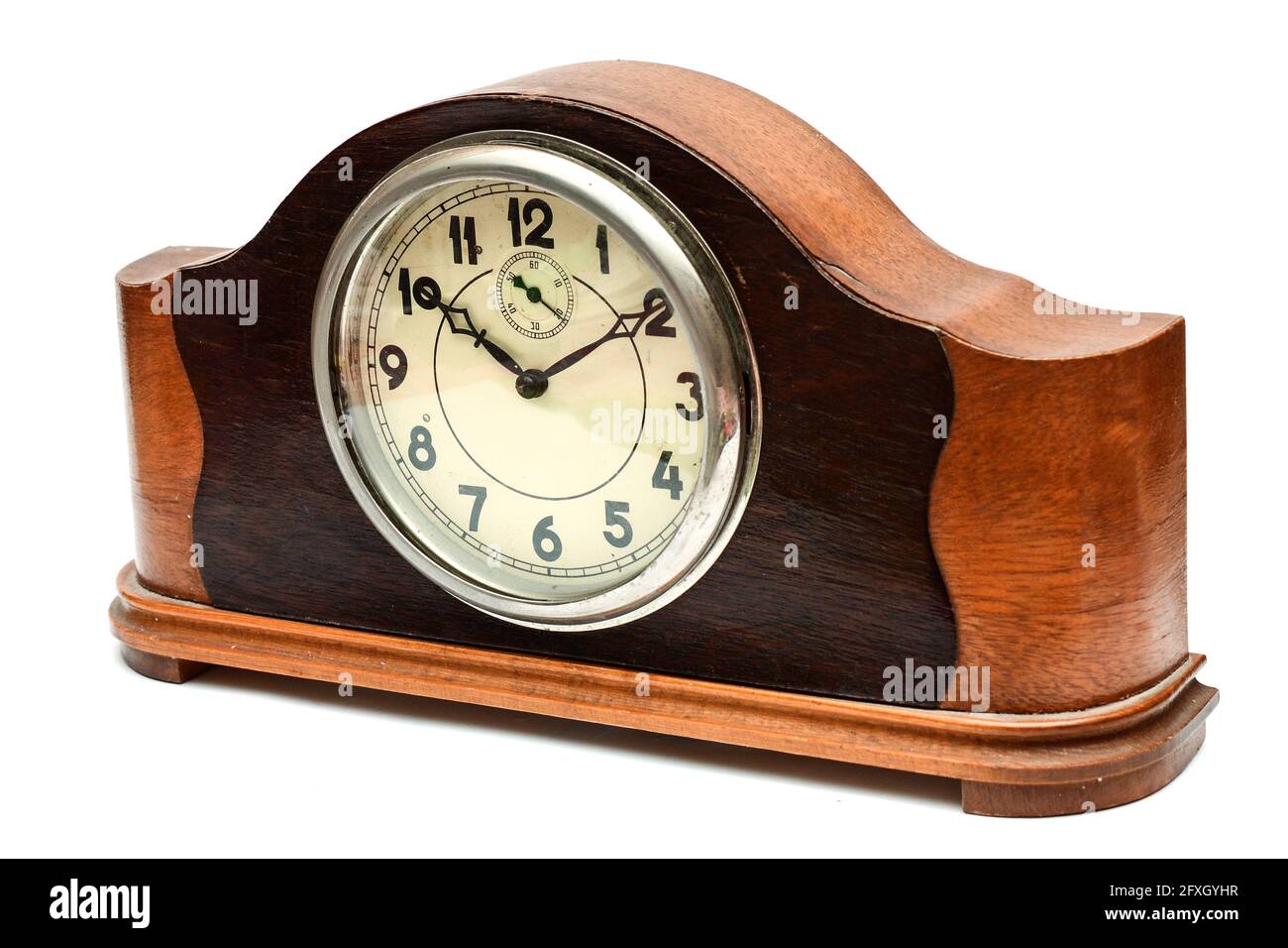 Wooden table clock on a white background Stock Photo - Alamy