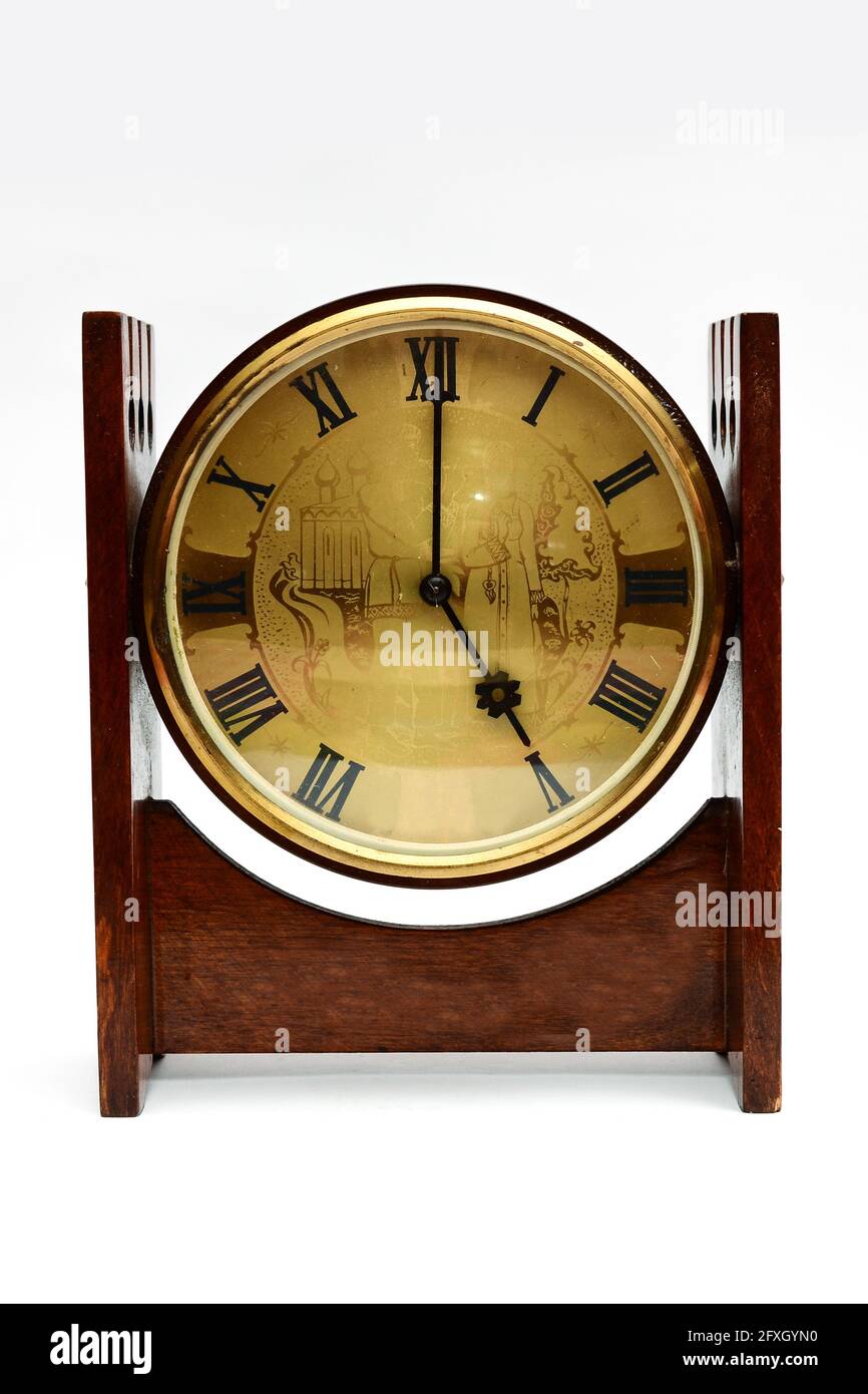old table clock on a white background Stock Photo - Alamy
