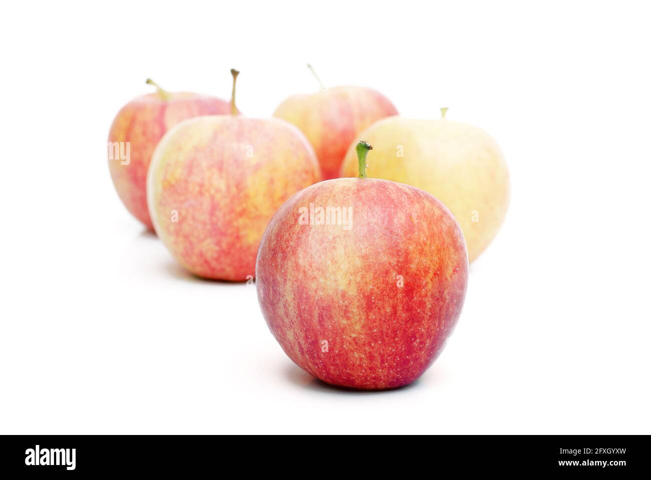 five red and yellow apples isolated on white background Stock Photo - Alamy