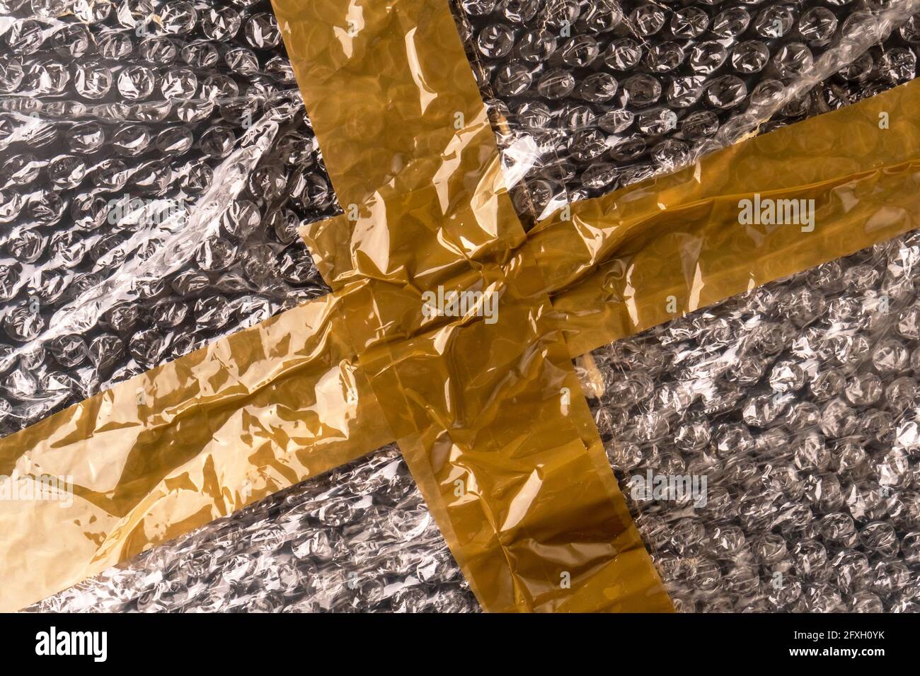 Adhesive tape plastic bubble wrap. Stock Photo