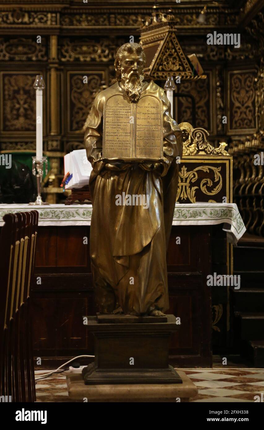 Valletta. Malta. St John's Co-Cathedral. The bronze statue of Moses holding The Tablets of Law in the presbytery. Stock Photo