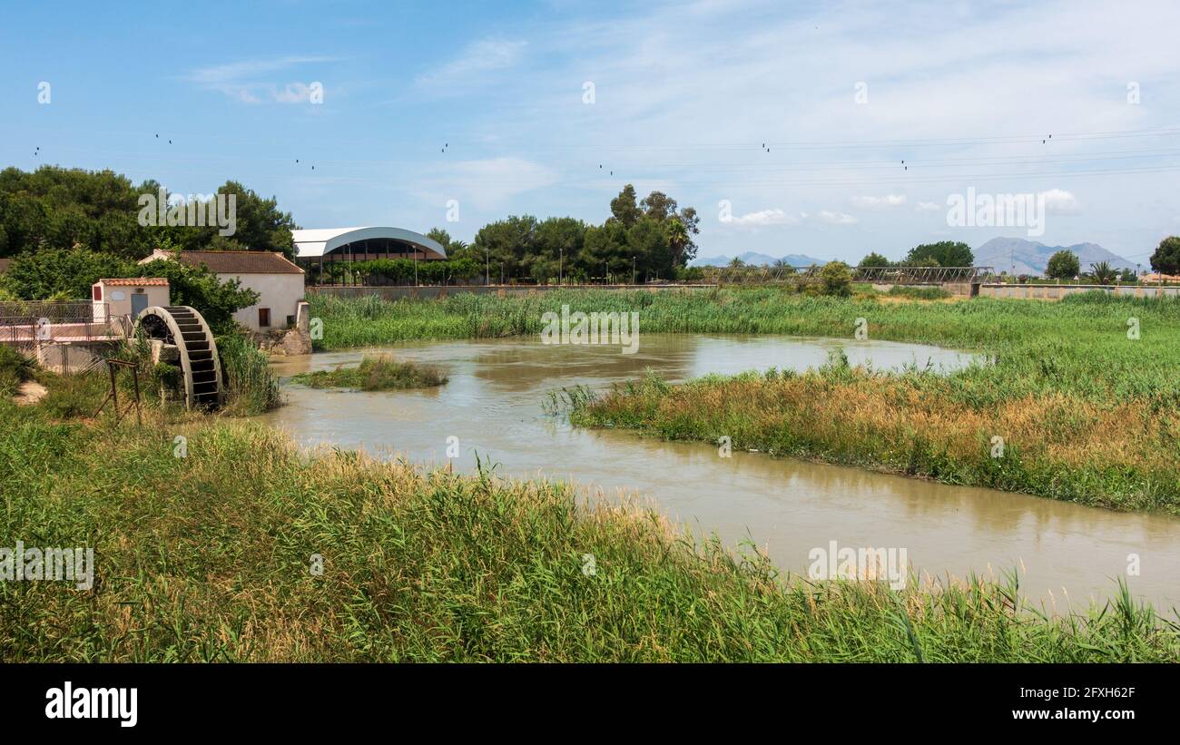 Water Wheel pump used to provide water for Orchards Stock Photo