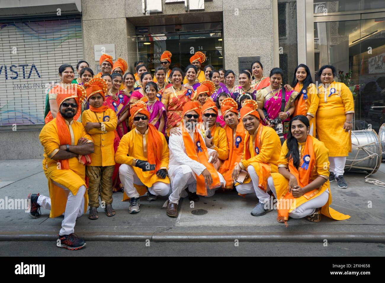 A group photo of members of the Jallosh drum corps. At the India Day Parade in Manhattan, New York City. Stock Photo