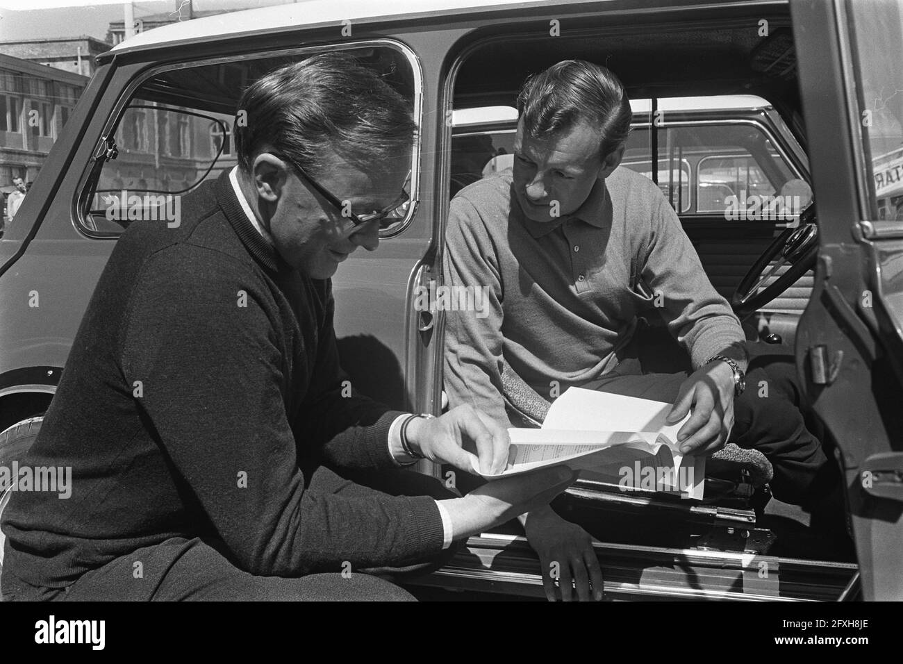 Preparations Tulip Rallye, number 31 Aaltonen (right) Liddon, number 32 and 33 Lampinen (right) and Ahava, April 25, 1966, Preparations, The Netherlands, 20th century press agency photo, news to remember, documentary, historic photography 1945-1990, visual stories, human history of the Twentieth Century, capturing moments in time Stock Photo