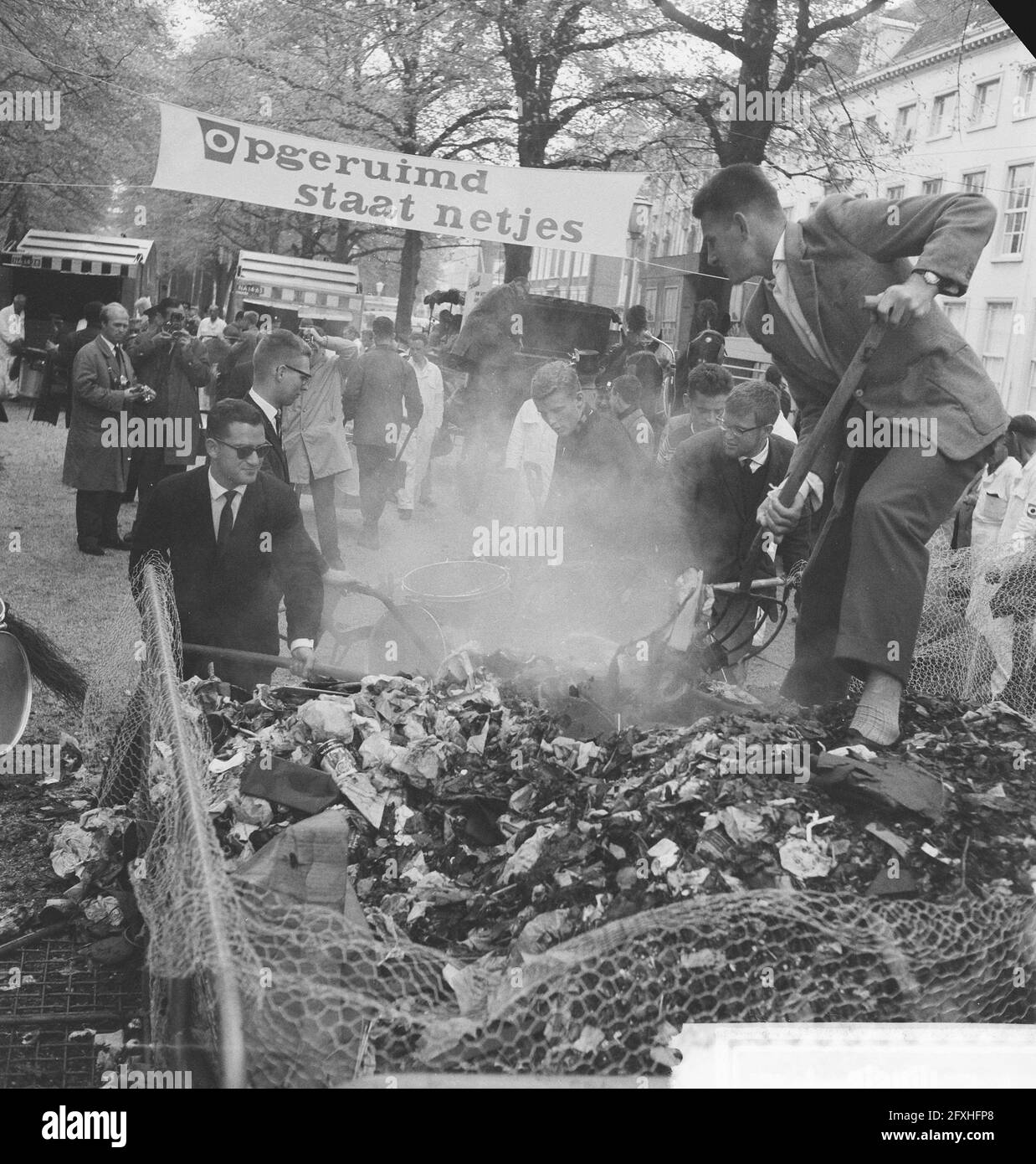 Dirt burning under the direction of Mayor Kolfschot Students burning