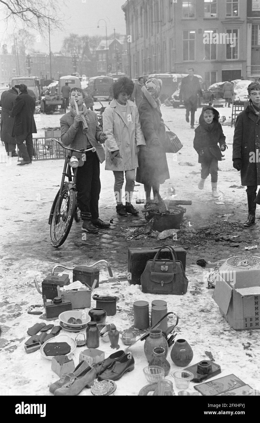 Fire pits on Waterloo Square because of the cold, December 27, 1962