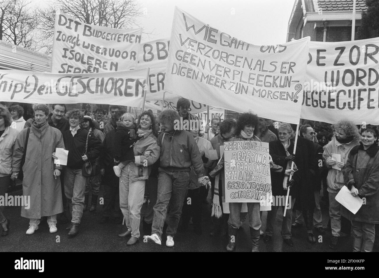 Employees Delta Hospital Poortugaal march in demonstrative march to protest meeting during work stoppage in protest of budget cuts, February 27, 1987, PURCHASE, protests, The Netherlands, 20th century press agency photo, news to remember, documentary, historic photography 1945-1990, visual stories, human history of the Twentieth Century, capturing moments in time Stock Photo
