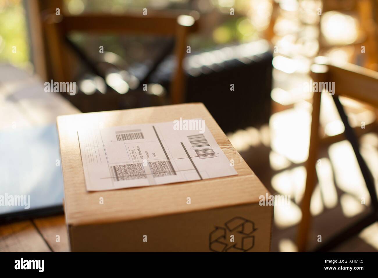 Close up shipping label on box Stock Photo