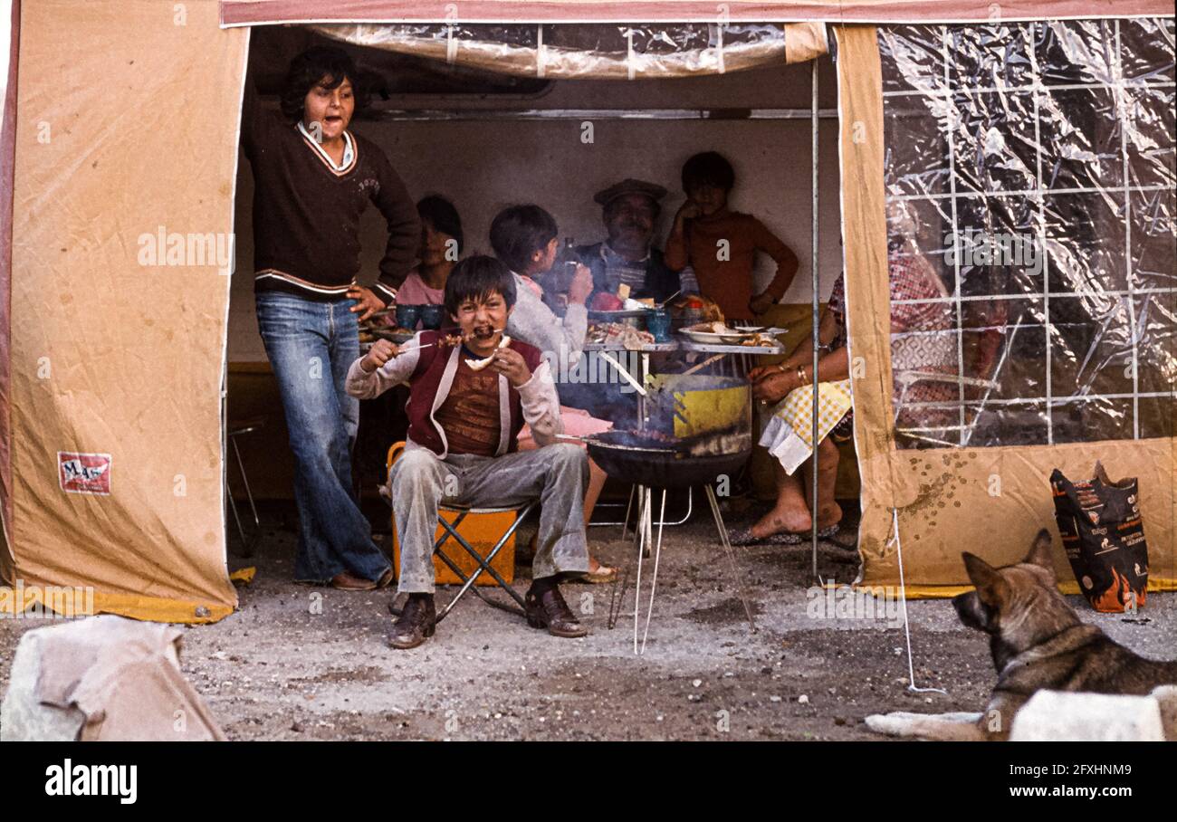 Roma family lunch in their camp during the pilgrimage to Saintes Maries de la Mer, France 1978 Stock Photo