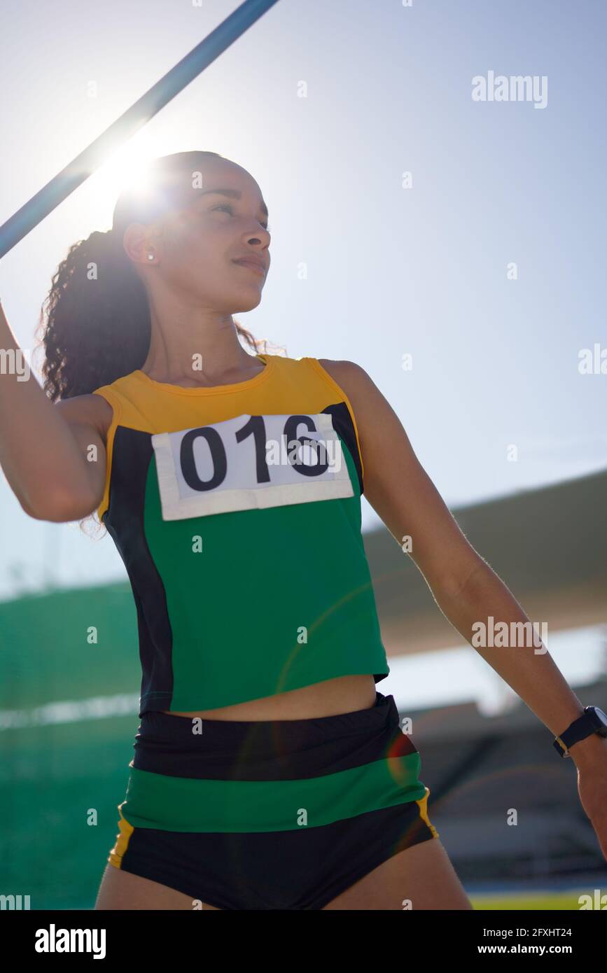 Female track and field athlete throwing javelin Stock Photo Alamy