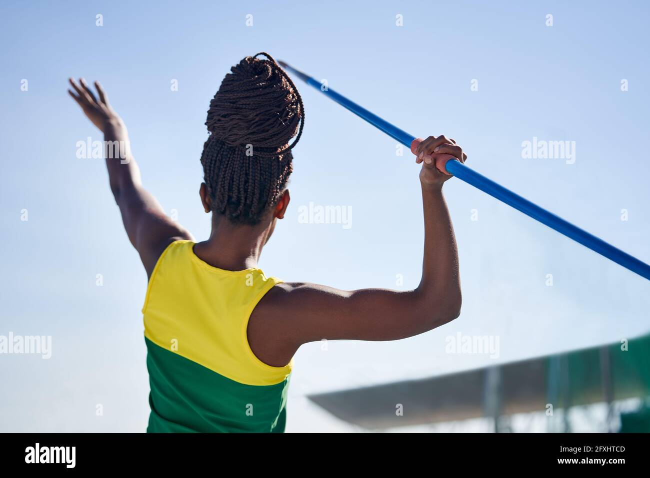 Female track and field athlete throwing javelin Stock Photo Alamy