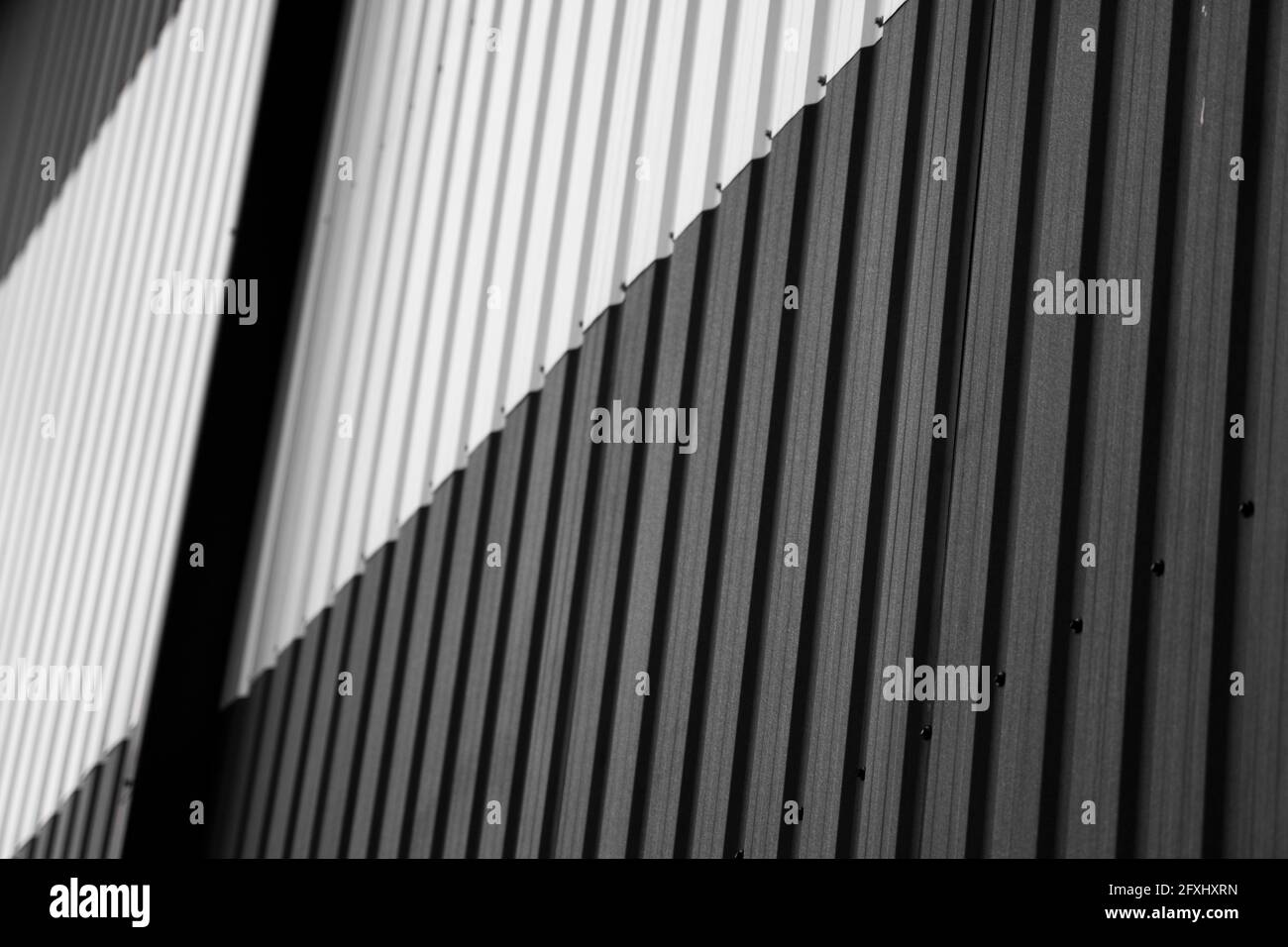 Details of black and white corrugated iron sheet used as a facade of a