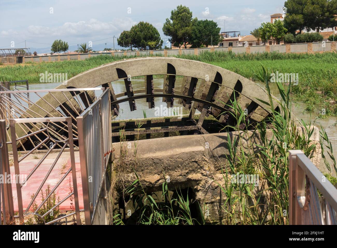 Water Wheel pump used to provide water for Orchards Stock Photo