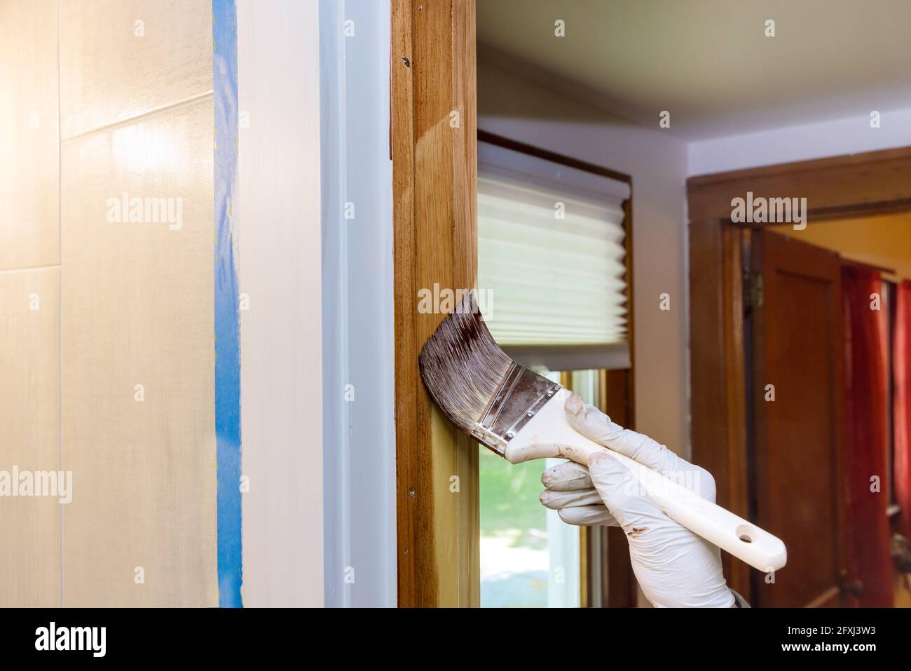 Applying stain hires stock photography and images Alamy